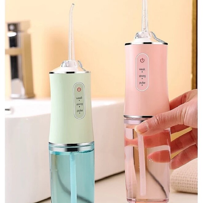 Máy tăm nước Oral Irrigator - Giá tham khảo: 185.000 vnd