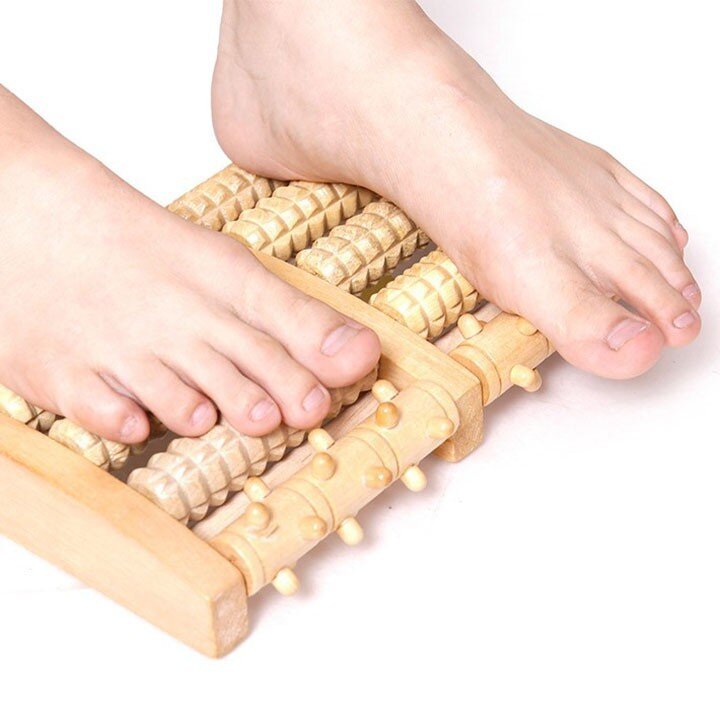 Tác dụng massage chân bằng gỗ 