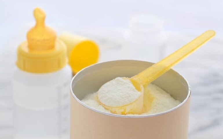 Until what age should children drink powdered milk?