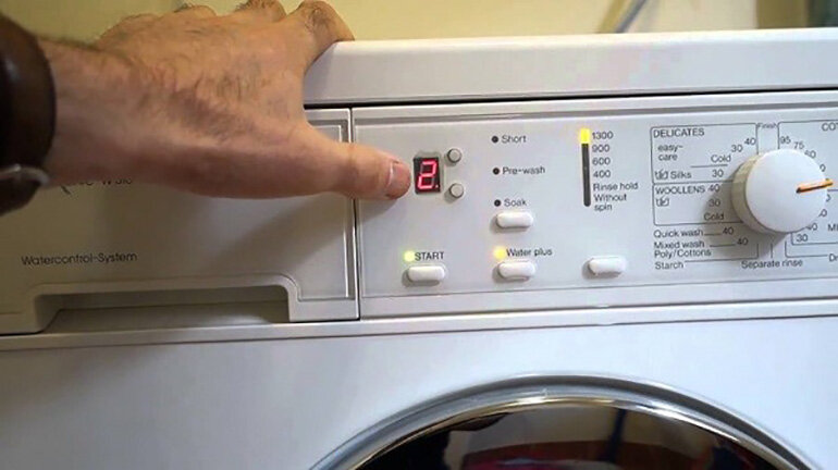 Lỗi E2 máy giặt Sharp: Nguyên nhân và cách khắc phục chi tiết