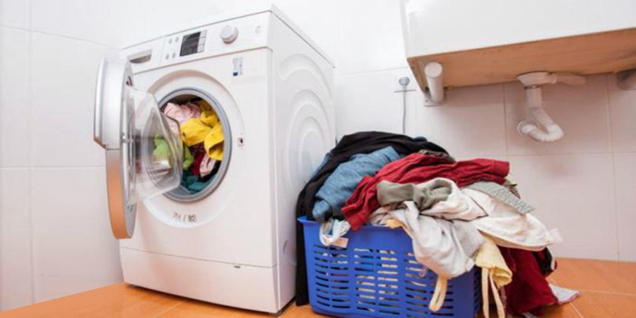 Giặt quần áo quá trọng lượng quy định gây hại máy giặt (Nguồn: Internet)