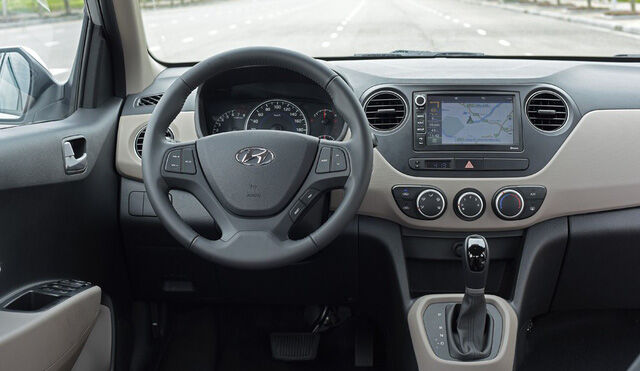 Hyundai Grand i10 thêm cân bằng điện tử, giá trên 390 triệu đồng - Ảnh 1.