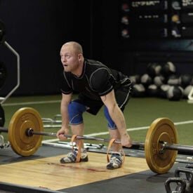 Hướng dẫn tập lưng dưới với tạ đòn và dây thun