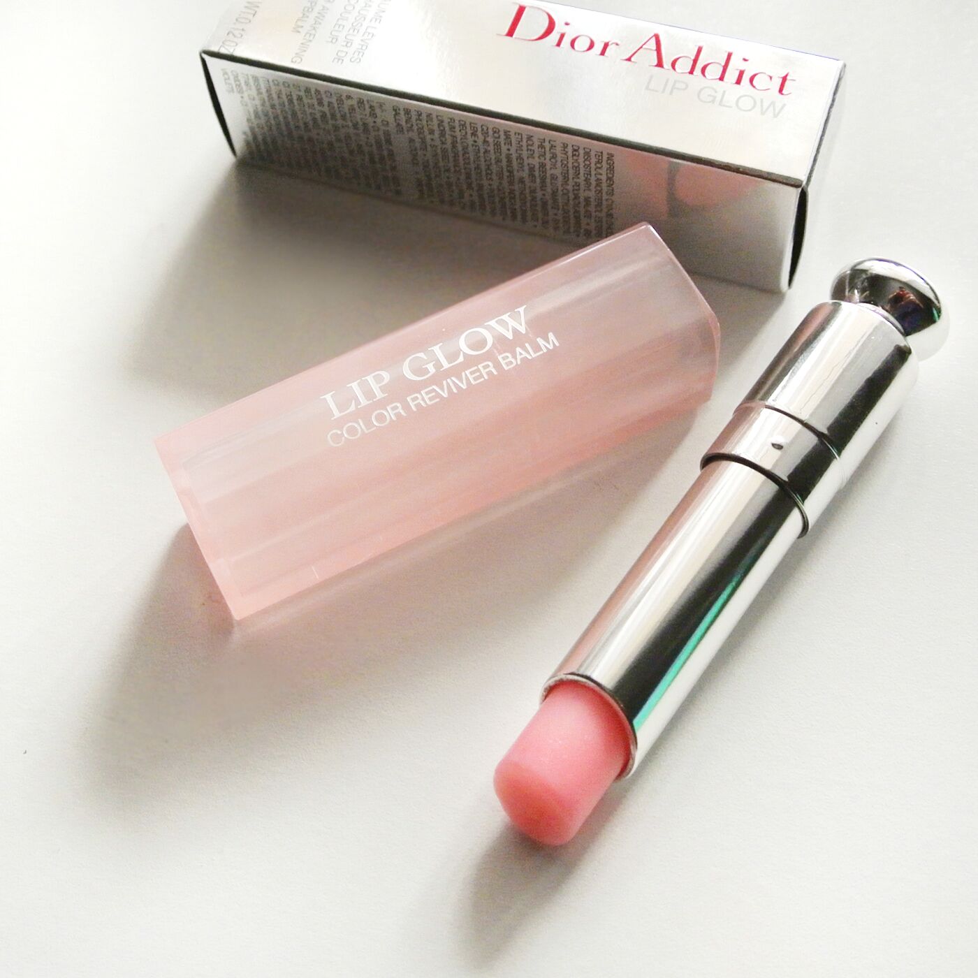 So sánh son dưỡng môi Dior Addict Lip Glow Color Reviver Balm và Philosophy Kiss me tonight
