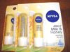 So sánh son dưỡng môi  Nivea A Kiss of Milk & Honey Lip Care và Nuxe Reve de Miel Ultra-Nourishing Lip Balm