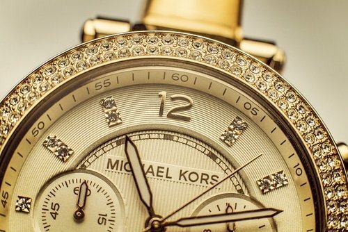 gold and diamond Michael Kors watch