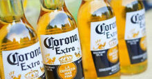 Thùng bia Corona Extra 24 chai 355ml của Mexico giá chỉ từng nào chi phí ?