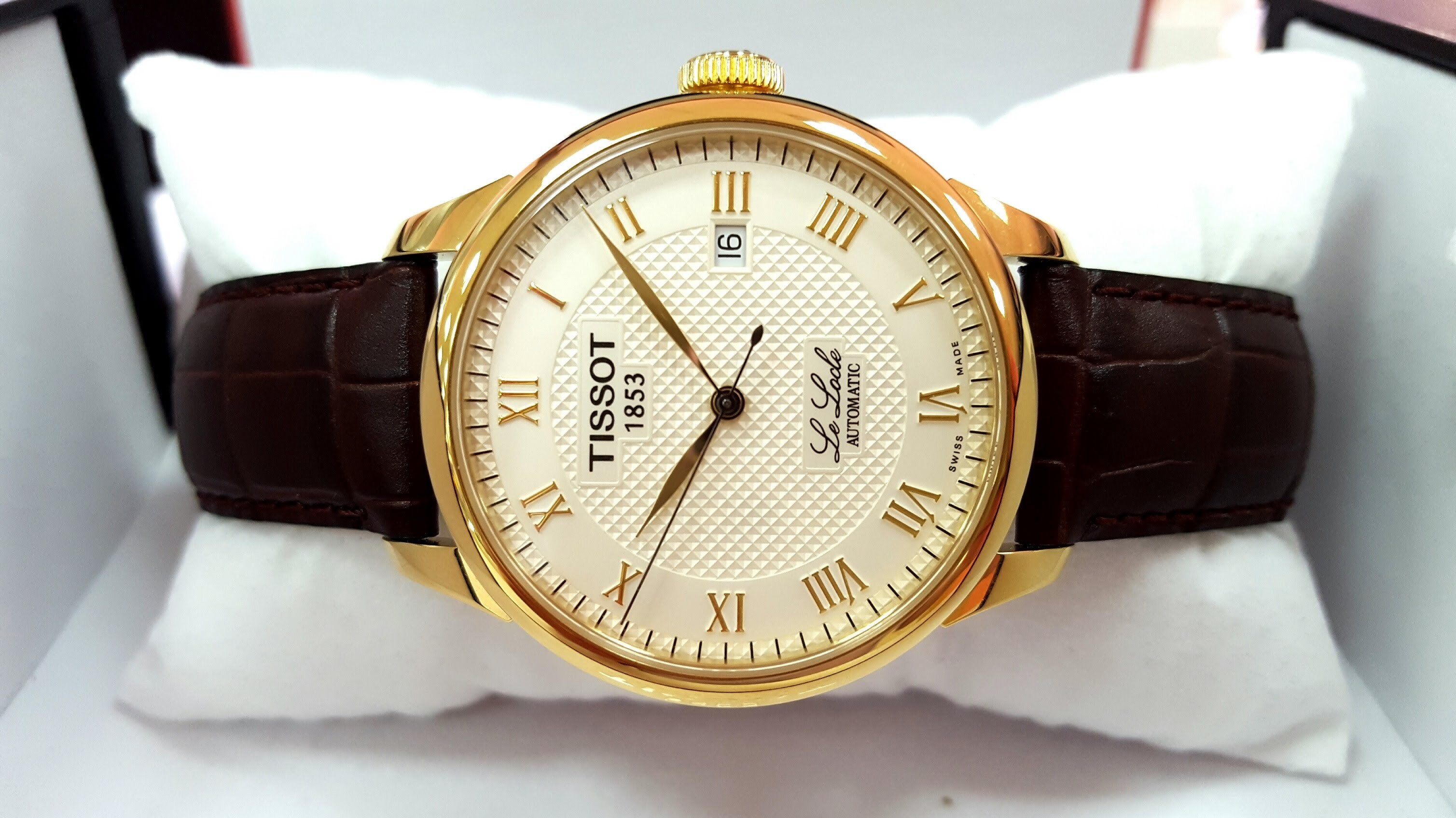 Tissot золотые