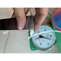 1 cuộn  ruy băng  lụa  to 1kg5 màu  trắng  gạo .