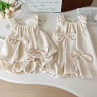 (9-27kg) Váy bí, bộ sát nách quần bồng đính nơ màu kem