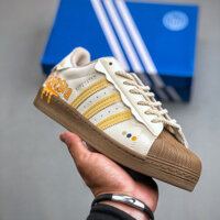 Adidas Originals Superhero Graffiti Vỏ Chuối Trắng Nâu Vàng
