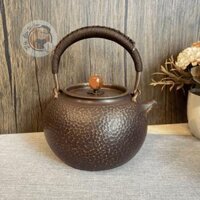 Ấm đồng nguyên khối