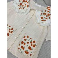 Áo bâu viền voan và hoạ tiết trái quýt Cát Tường May Mắn nhà Nitta của Thái Lan