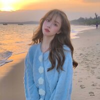 Áo crotop xanh pastel cúc thêu hoa cá tính