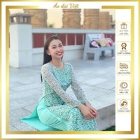 Áo dài 2025 hoa cúc nhí 4 tà màu xanh ngọc truyền thống may sẵn giáo viên