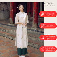 Áo dài cách tân Linh Lan, áo dài dáng suông 4 tà với họa tiết chiếc lá được thêu nổi trên nền tơ 2 lớp