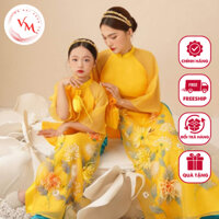 Áo dài cặp mẹ và bé gái Cúc Chi màu vàng nổi chất liệu tơ organza bóng mượt đính kết hoa nổi - Áo dài Viên Minh - VM03