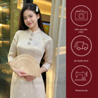 Áo dài gấm Tết với dáng áo dài truyền thống cùng nét hiện đại sang chảnh kết hợp cúc đá pha lê sang xịn mịn kèm quần lụa