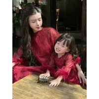 Áo dài kim tuyến phối lông ở tay cho bé gái