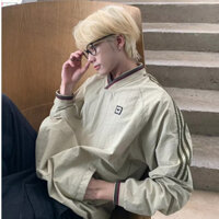 Áo khoác gió phong cách Mỹ 2024 Cặp đôi mới Webbing cổ chữ V Áo len tất cả các trận đấu Áo dài tay