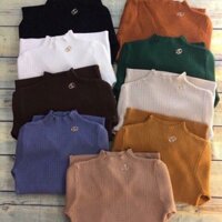Áo len lỗ tag Gc