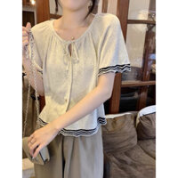 Áo montoghi cột nơ cổ