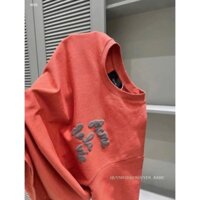 Áo phông nữ cộc tay màu cam chữ acme