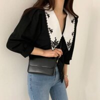 Áo sơ mi đen cổ trắng tay lỡ