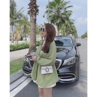Áo sơ mi xanh cốm cúc bọc
