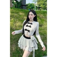 Áo tay dài phối chân váy ngắn có lót và phụ kiện, chất liệu ren thun độc đáo.