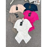 Áo thun form ôm, vạt chéo freesize <60kg