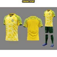 Áo Úc vàng thun mè logo thêu hoa văn in mực chuyển nhiệt - Áo đá banh tuyển australia vàng