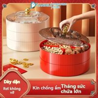 Bàn cà phê phòng khách LANDELIHome có ngăn nhiều lớp đựng đĩa trái cây.