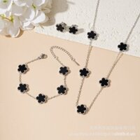 Bán nóng Vòng tay vàng cỏ năm lá 18K Bộ thép titan hoa năm lá thép không gỉ giữ màu vòng tay vòng cổ Bộ Bông tai