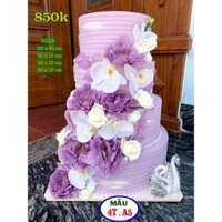 bánh cưới 4 tầng màu tím hoa tím , đôi thiên nga bạc ,bánh giả trưng bày tiệc cưới , nhà hàng hiện đại