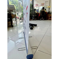 Banner chân cuốn - standee chân cuốn - Ngân In Kỹ Thuật Số