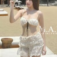 Bikini hoa trà Kim Anh Bùi một mảnh kín đáo, kiểu bodysuit tôn dáng bầu bí bon chen