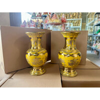 Bình bông bằng xứ dâng hoa cúng Phật...