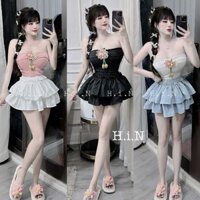 Bộ cúp vạt nhọn và chân váy nhún xòe tầng kèm tag hoa len - Size 40-53kg