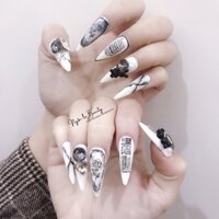 bộ móng giả thiết kế  đính đá trắng sữa hoạ tiết báo