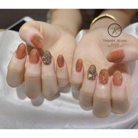 bộ móng giả thiết kế  thạch cam điểm nhũ đính đá