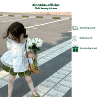 Bộ quần áo bé gái phong cách Hàn Quốc gồm áo sát nách bèo nhún và quần đùi màu xanh, quần áo trẻ em mùa hè.