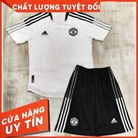 Bộ Quần Áo Tập Luyện Đá Bóng Training MU Trắng Đen Không Chữ Full Logo Thêu Vải Gai Mịn Thái0