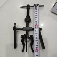 bộ vam cảo vòng bi chìm bên trong nắp động cơ thân máy