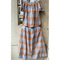 Bộ váy và áo caro phối thun chất kate