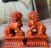 Cặp tượng kỳ lân được làm bằng chất liệu gỗ hương đá liền khối kt cao 20109cm