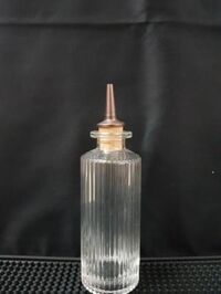 CHAI BITTER TRỤ HOA VĂN SỌC