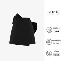 Chân váy chữ A, đầm nữ NKN Myra màu đen, thiết kế buộc nơ chéo độc đáo, chất liệu cao cấp.