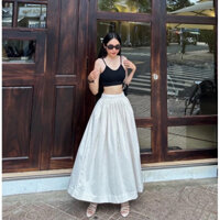 Chân váy màu be đang xòe phom dài