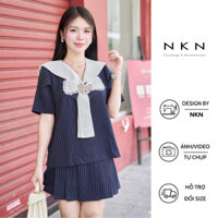 Chân váy nữ NKN Lasy màu xanh tím than kẻ, dáng chữ A basic, chất liệu cao cấp.